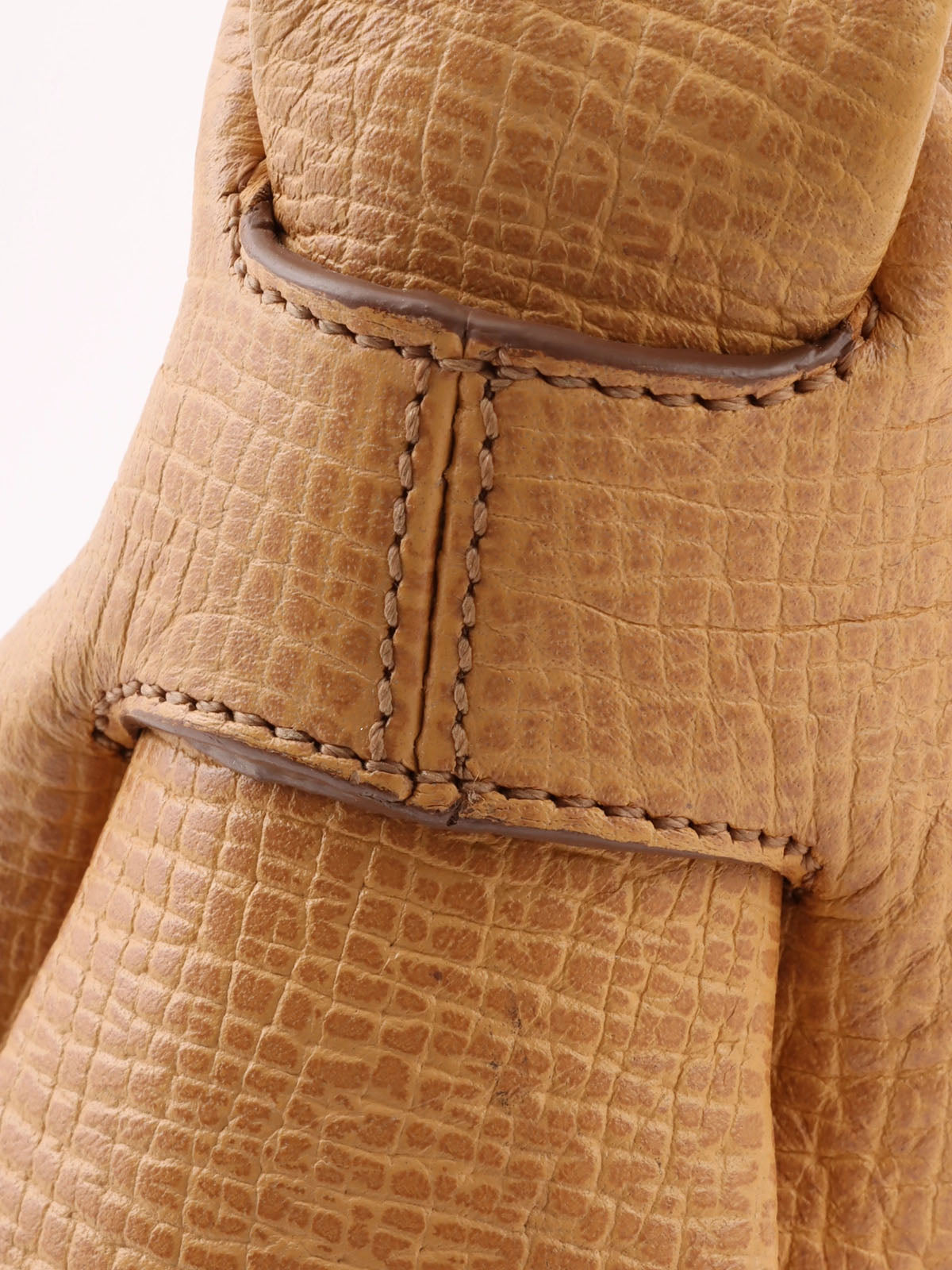 Logo embossed shoulder bag in beige