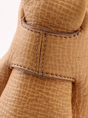 Logo embossed shoulder bag in beige