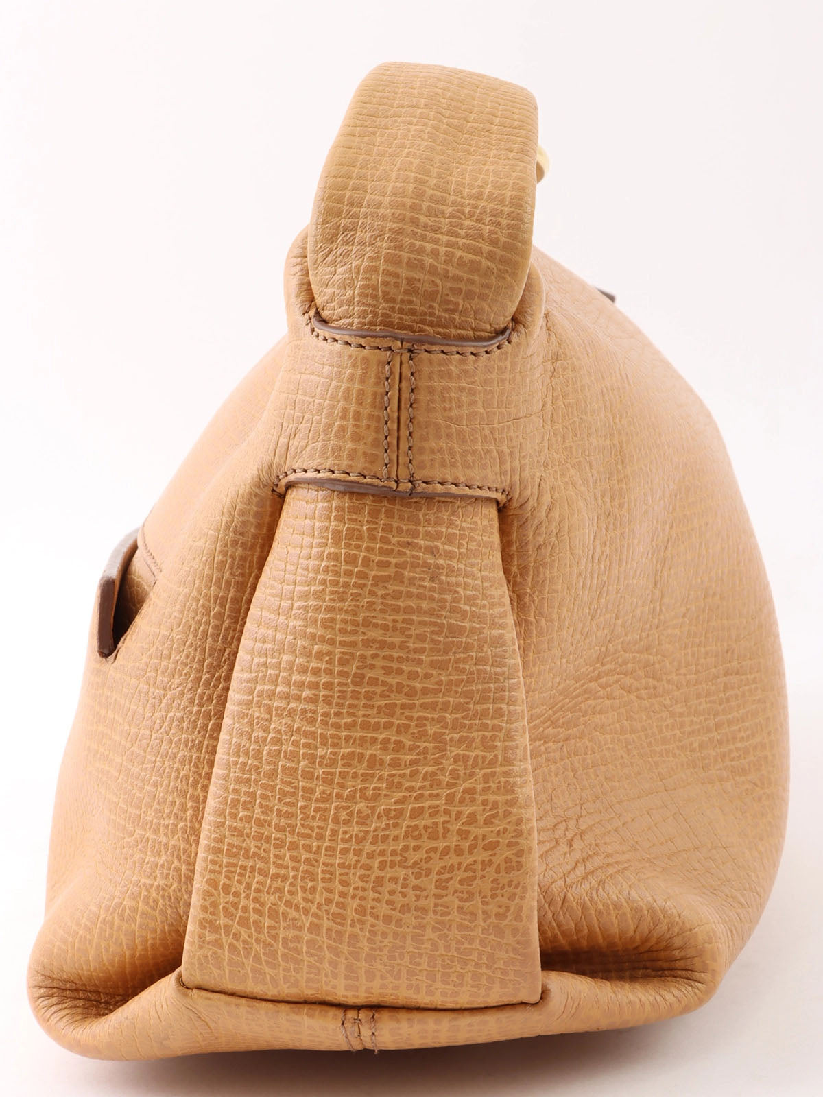 Logo embossed shoulder bag in beige