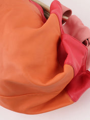 Nappa Aire handbag in orange, pink, and metallic gold