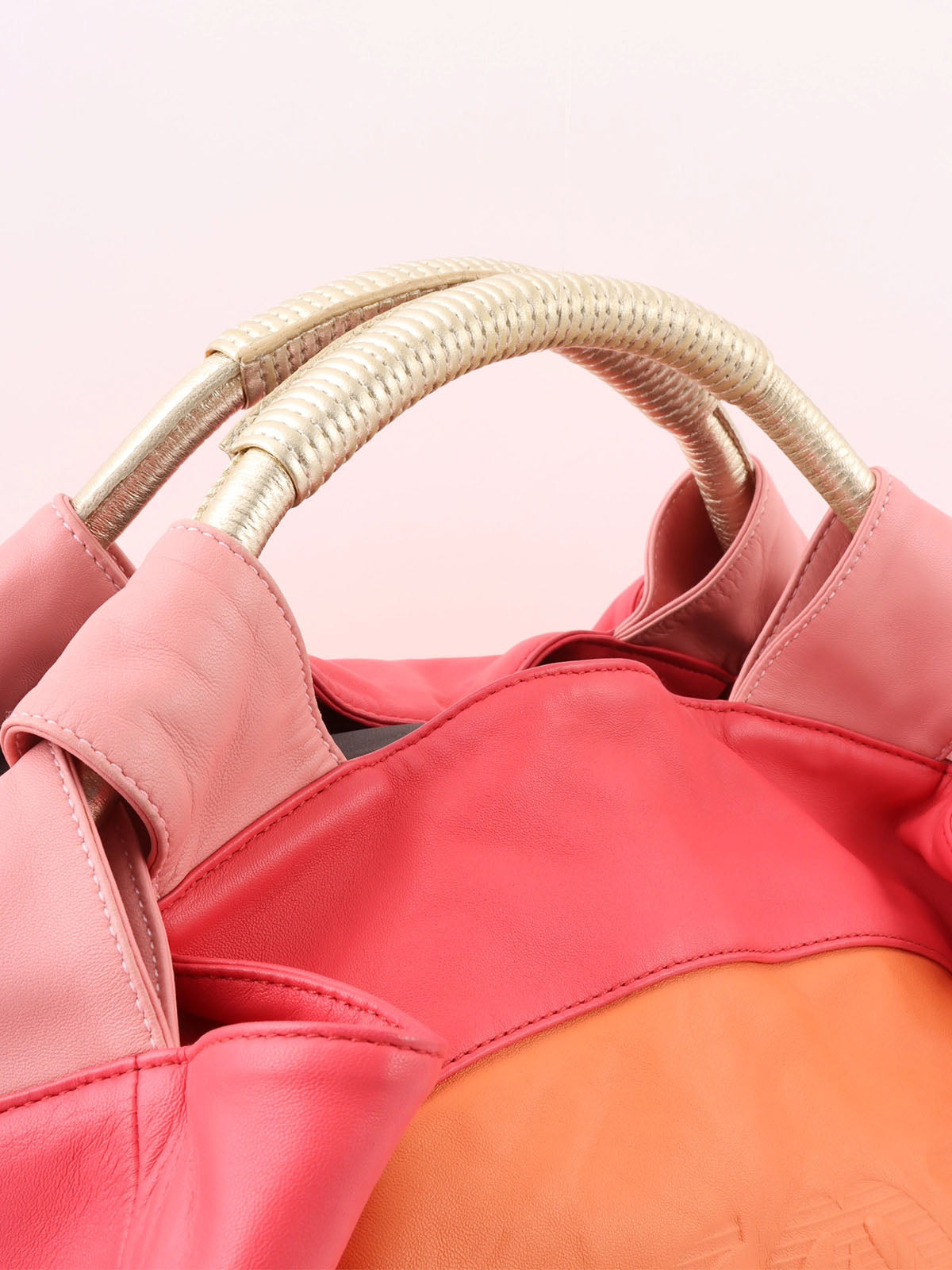 Nappa Aire handbag in orange, pink, and metallic gold