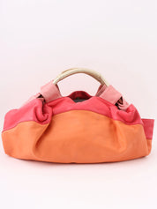Nappa Aire handbag in orange, pink, and metallic gold