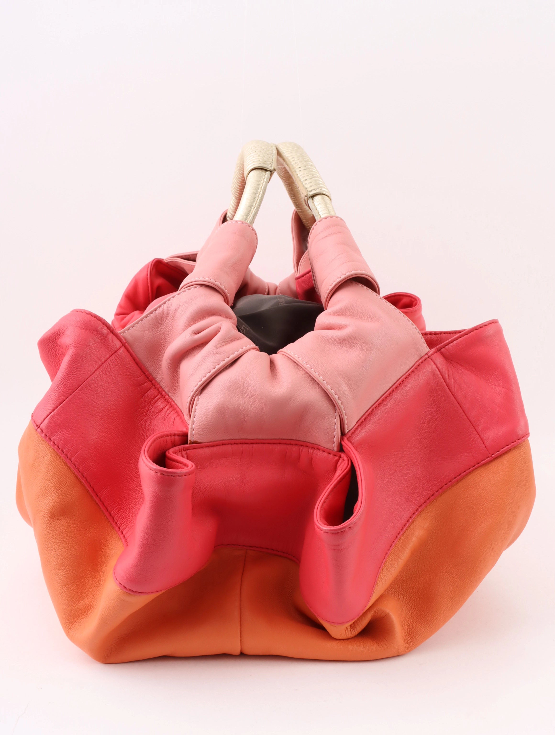 Nappa Aire handbag in orange, pink, and metallic gold