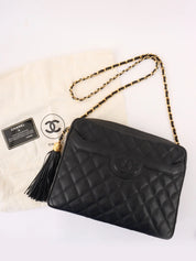 1992 Caviar Skin Matelasse CC Mark Stitch Tassel Chain Shoulder Bag in Black