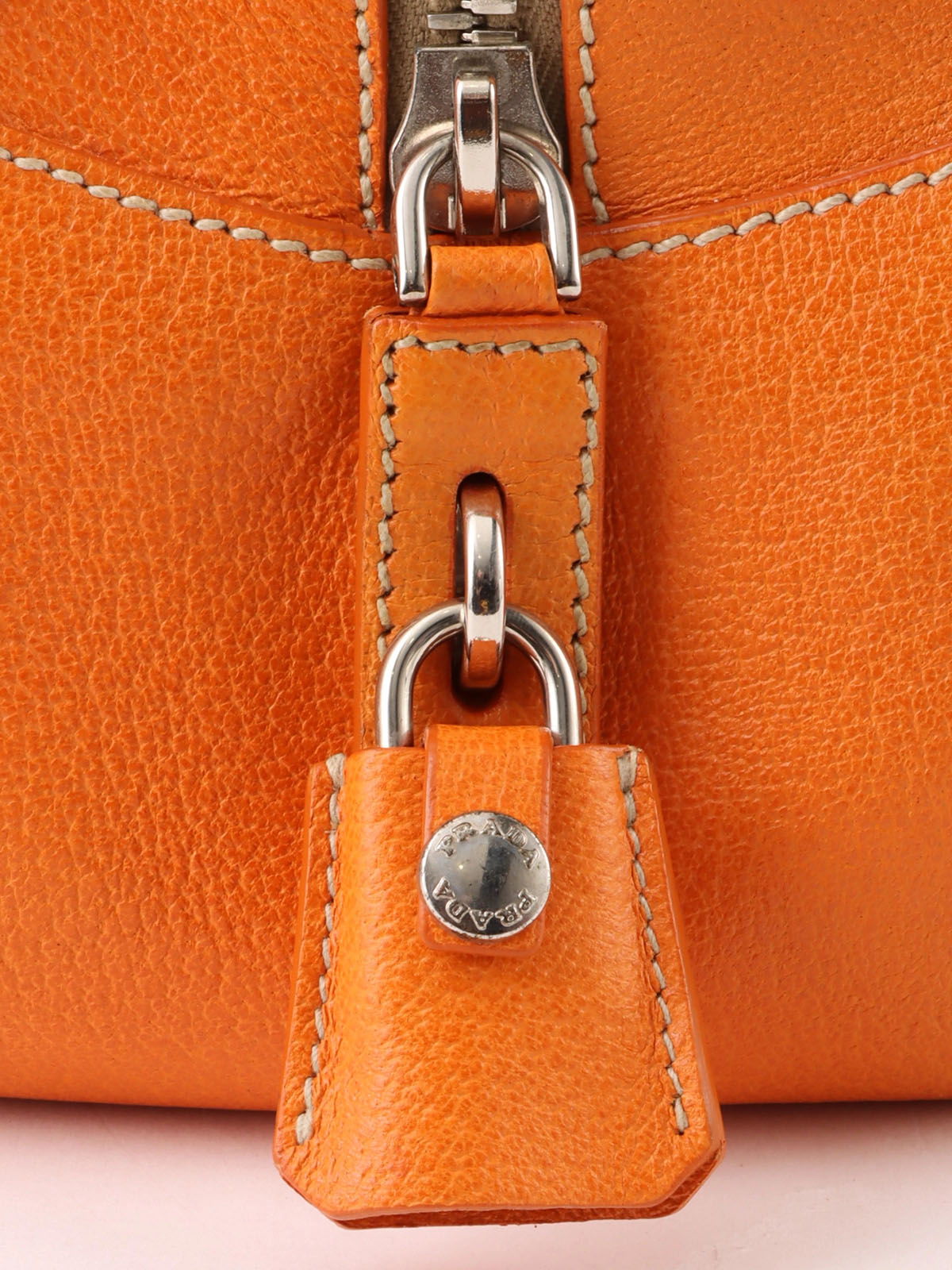 Canvas and leather combination logo plate shoulder bag in beige/orange
