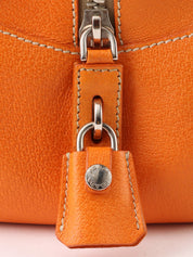 Canvas and leather combination logo plate shoulder bag in beige/orange