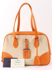 Canvas and leather combination logo plate shoulder bag in beige/orange