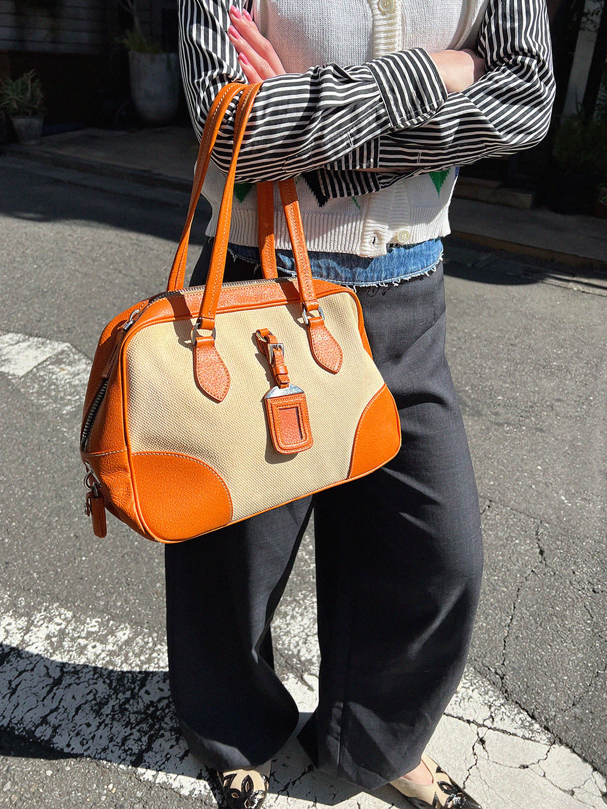 Canvas and leather combination logo plate shoulder bag in beige/orange