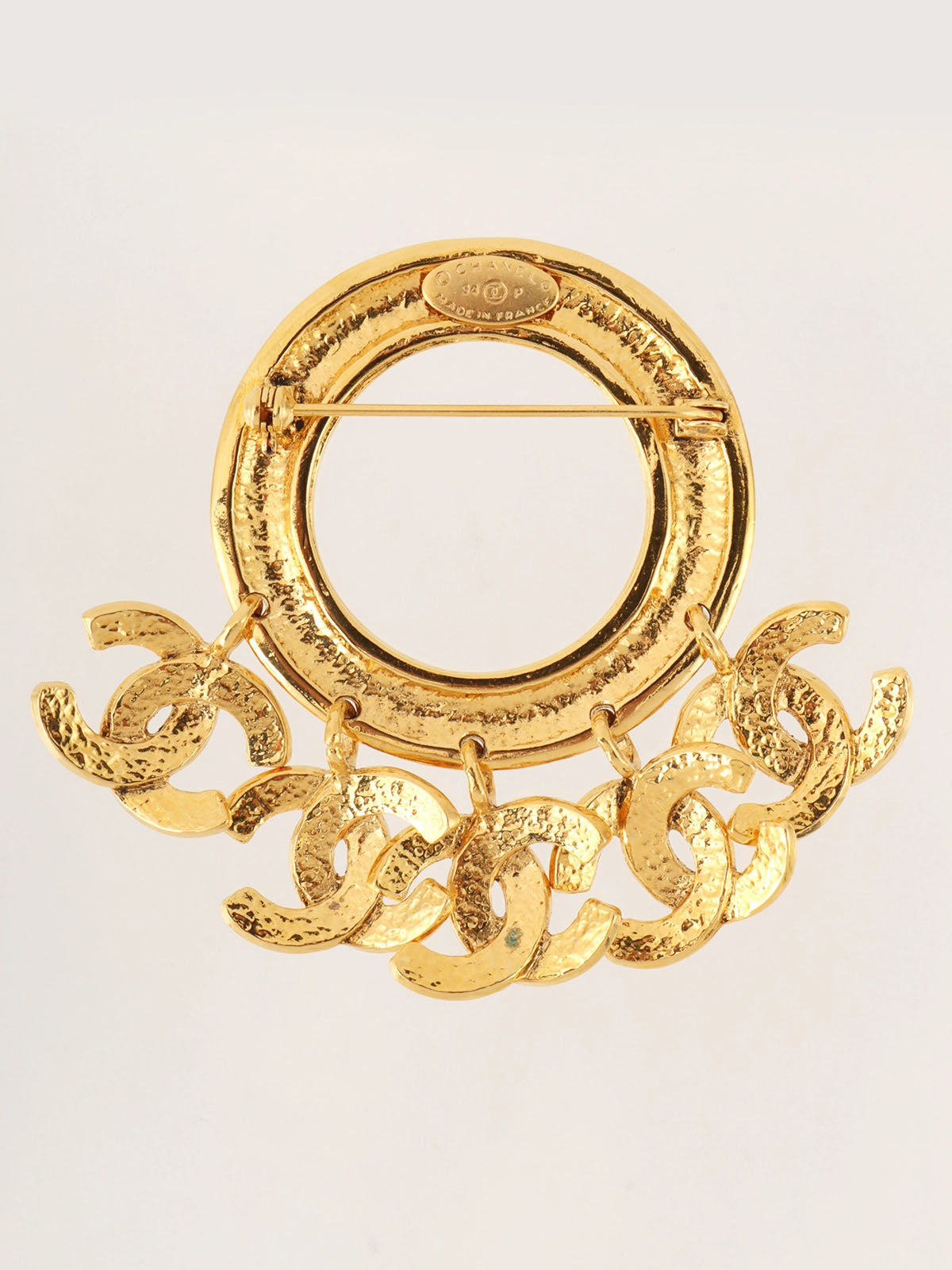 1994 Made Circle 5CC Mark Swing Brooch Gold