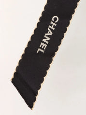 Logo ribbon brooch in black