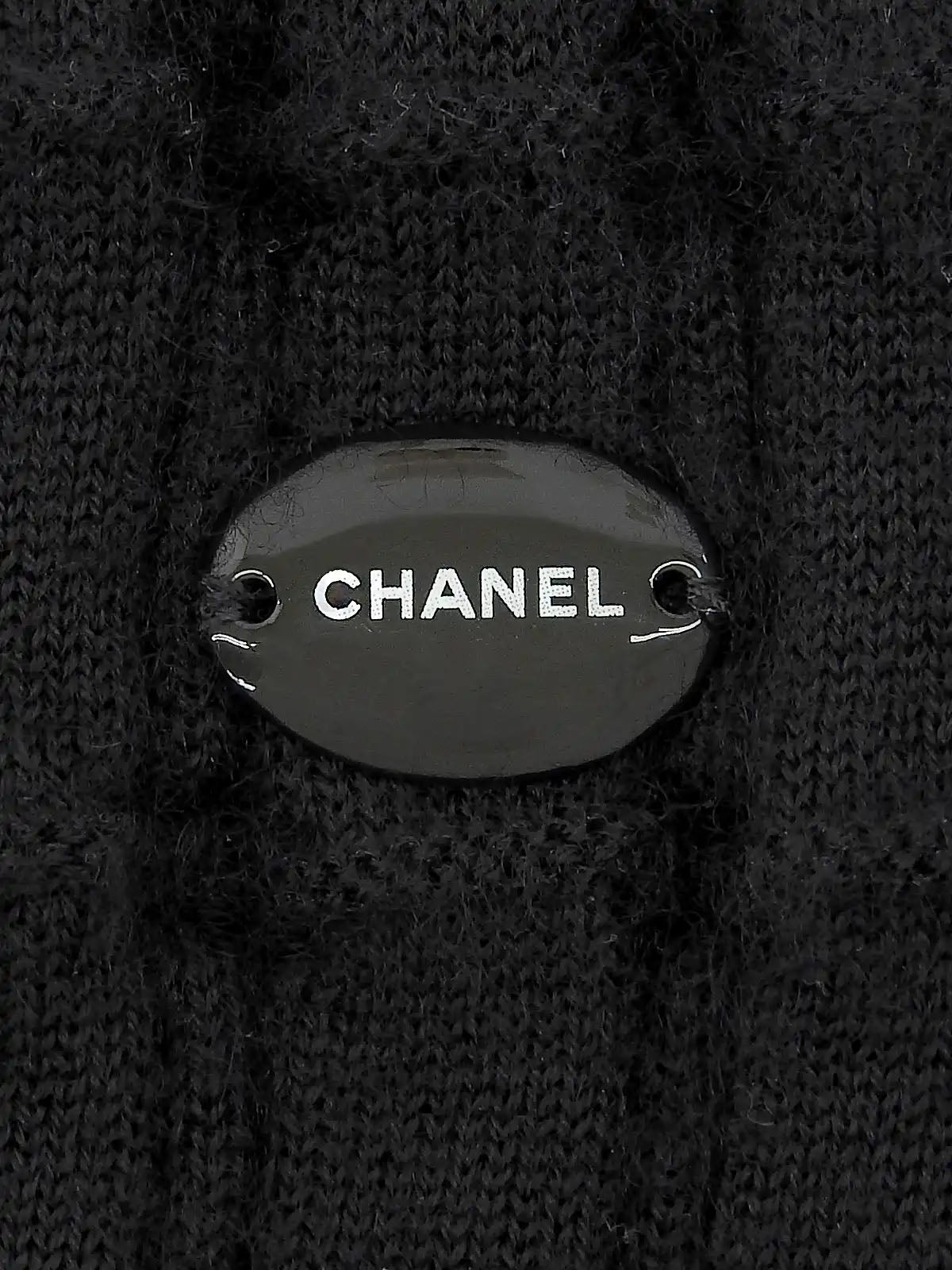 カシミアミニロゴプレートノースリーブニット ブラック