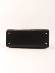 Logo plaque quilted handbag in black
