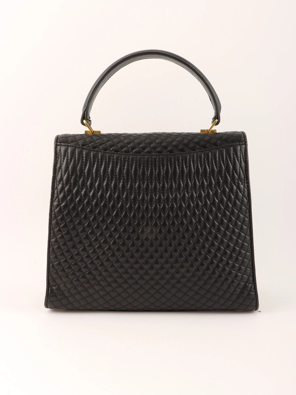 Logo plaque quilted handbag in black