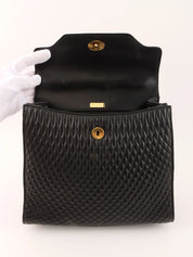 Logo plaque quilted handbag in black