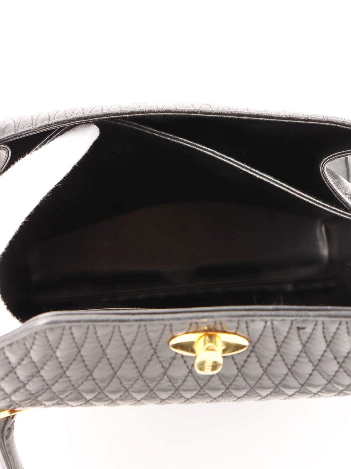 Logo plaque quilted handbag in black