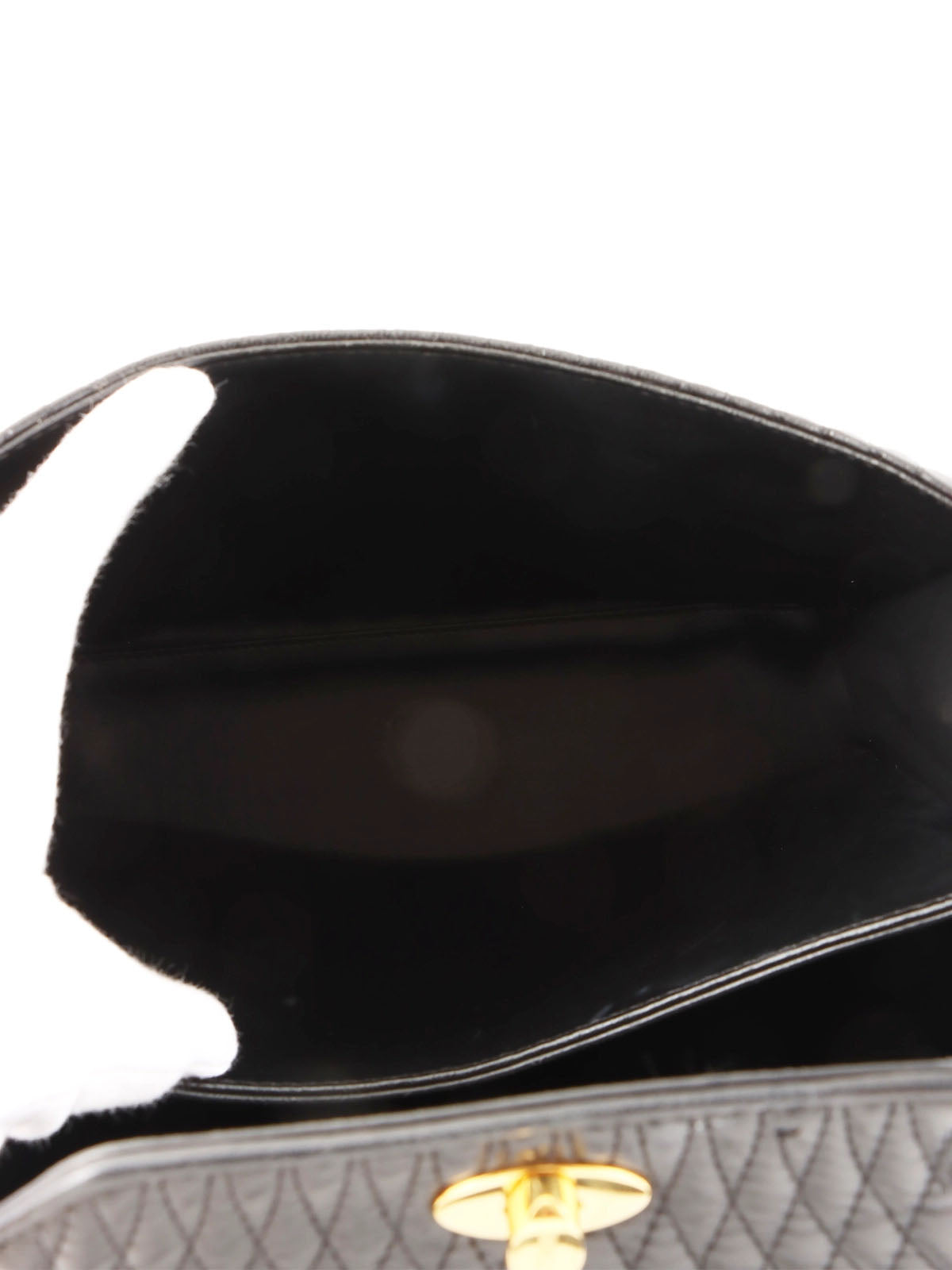 Logo plaque quilted handbag in black