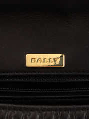 Logo plaque quilted handbag in black