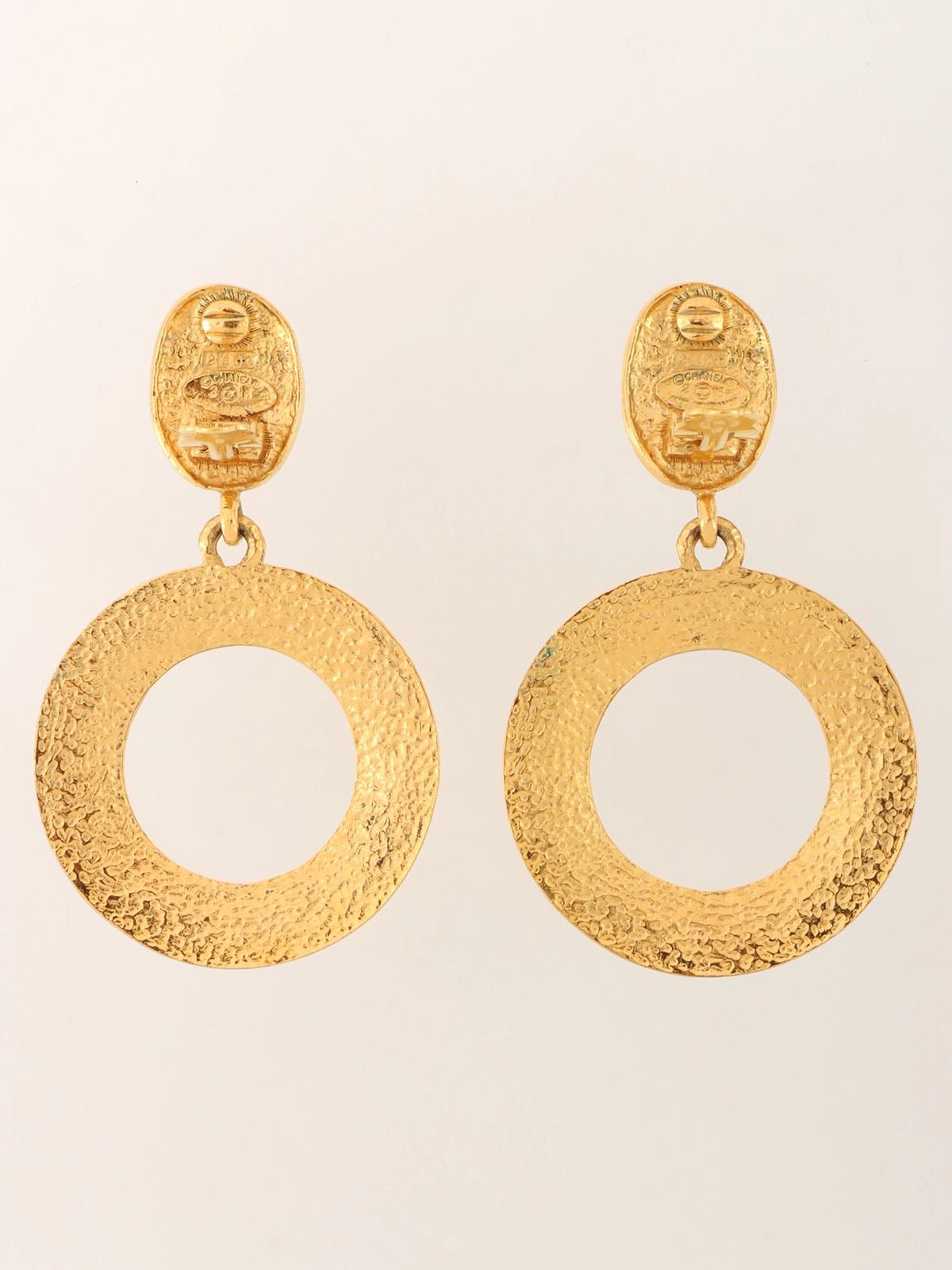 1991 Oval Crown CC Mark Swing Hoop Earrings Gold