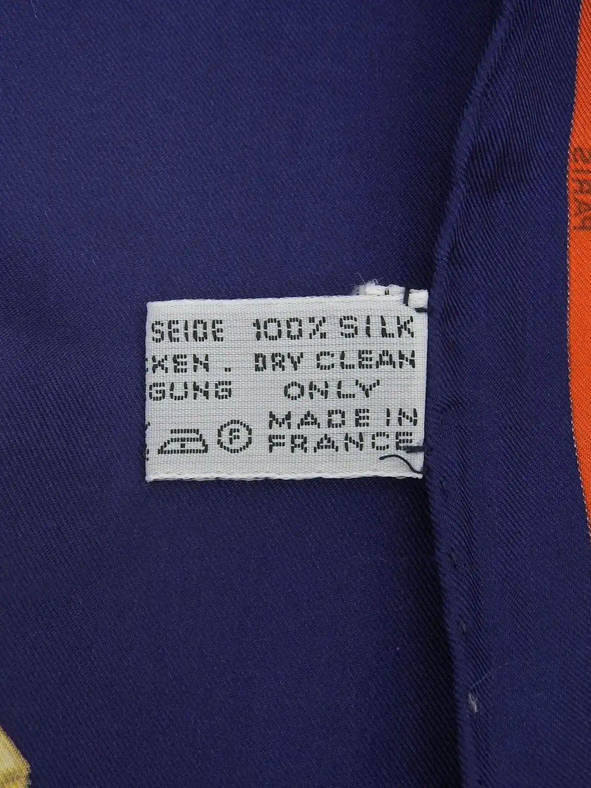 Logo chain pattern scarf in navy, orange, and multicolor