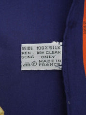 Logo chain pattern scarf in navy, orange, and multicolor
