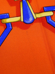 Logo chain pattern scarf in navy, orange, and multicolor