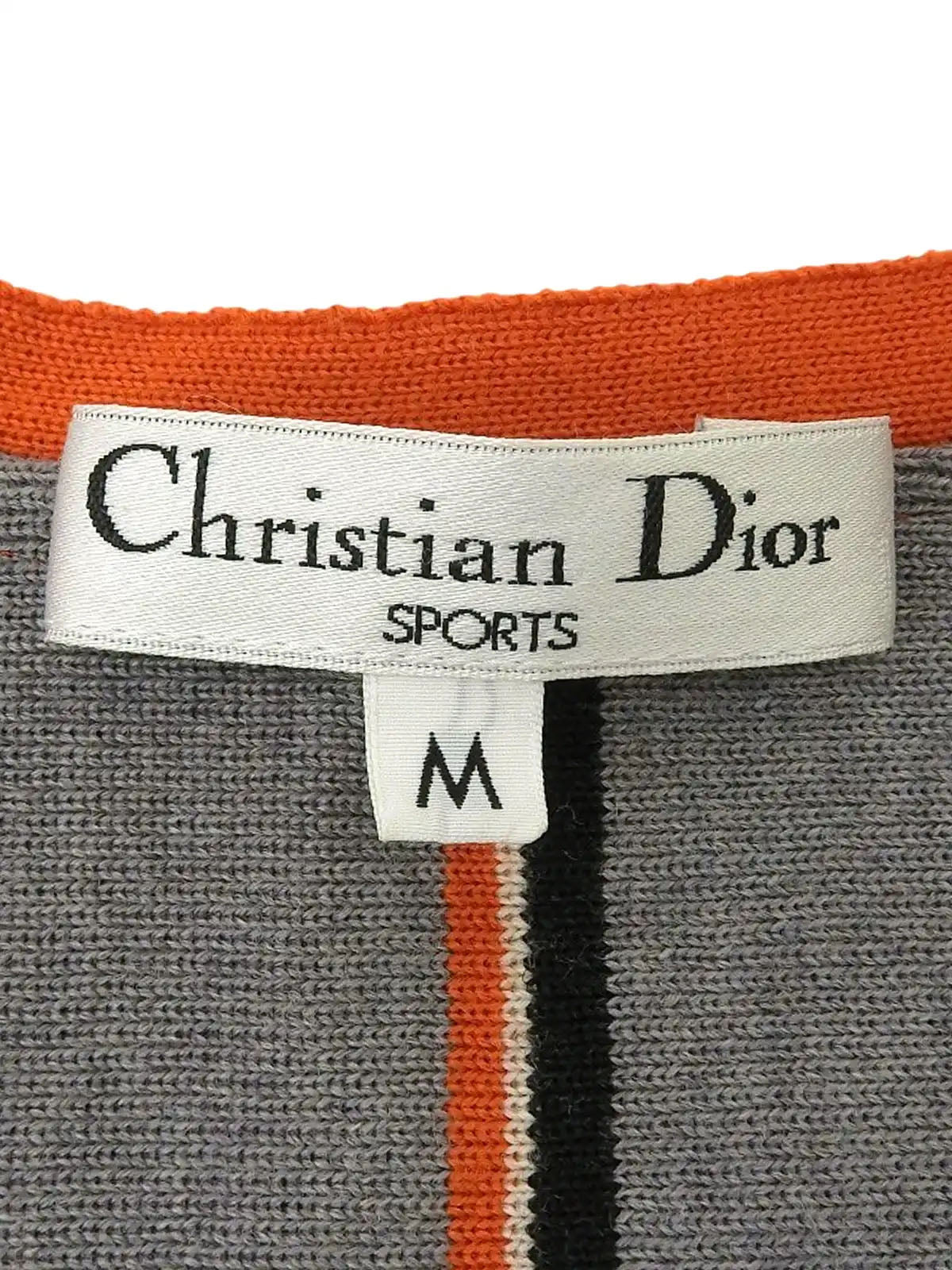 バイカラーロゴワッペンニットベスト　グレー／オレンジ