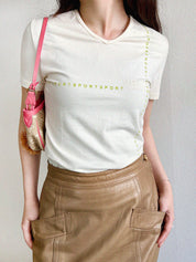 Ivory V-neck logo half-sleeve top