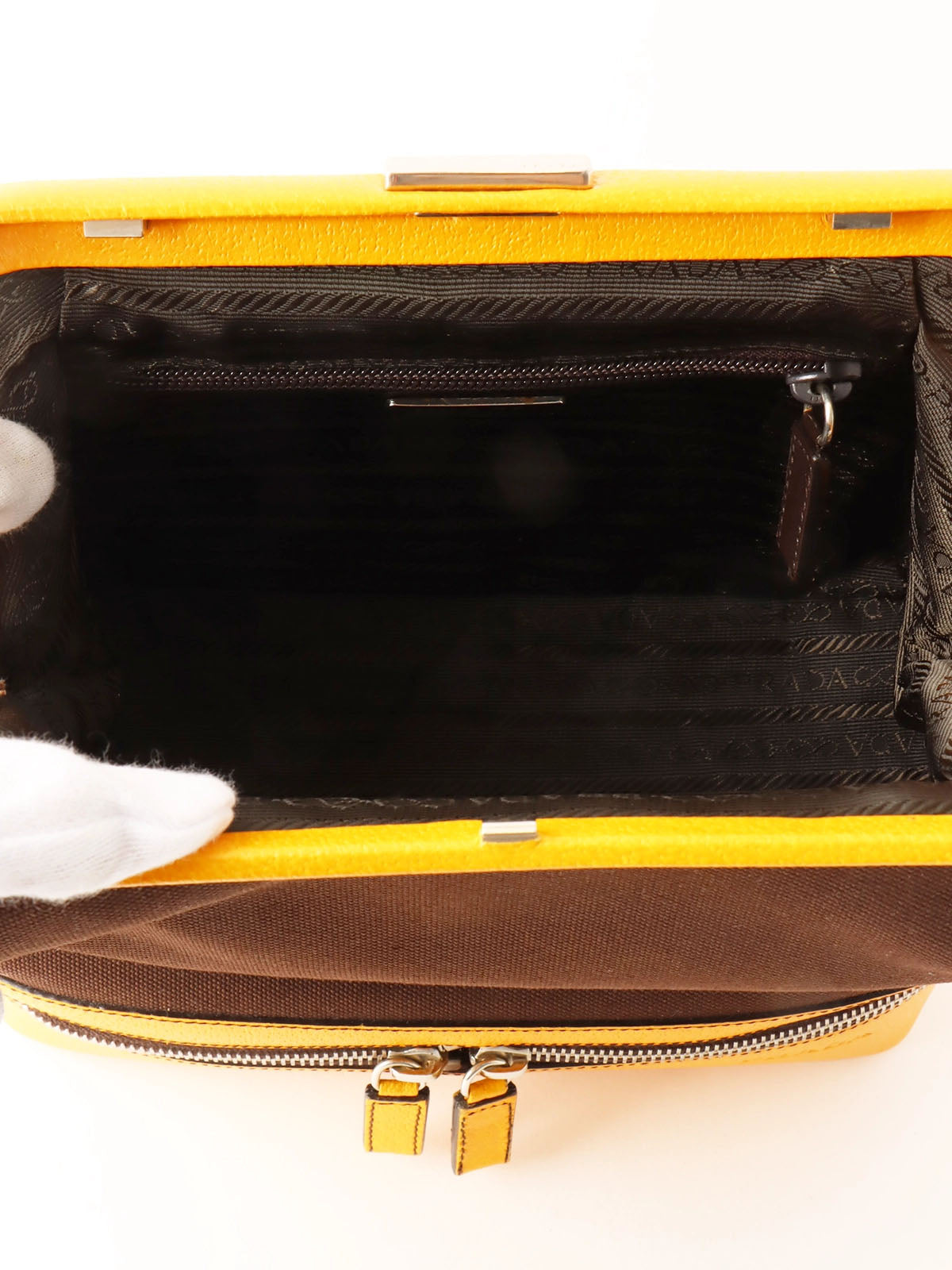Canvas and leather combination logo embossed clasp handbag in brown/yellow
