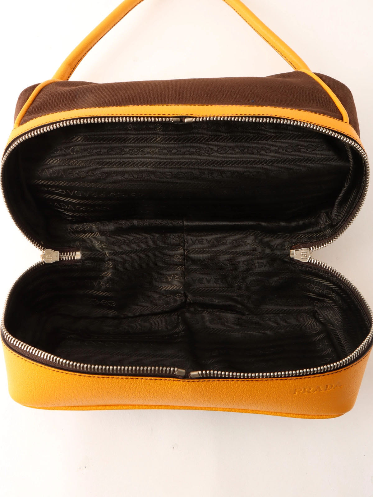 帆布皮革组合标志压纹口金手提包 棕色/黄色