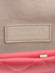 Made in 2012, pink matelassé stitch CC mark clasp clutch bag