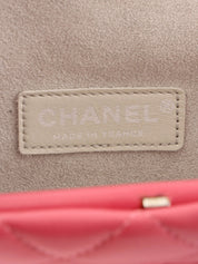Made in 2012, pink matelassé stitch CC mark clasp clutch bag