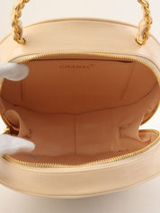 1995 年专利圆形 CC 标志化妆包，米色/黑色