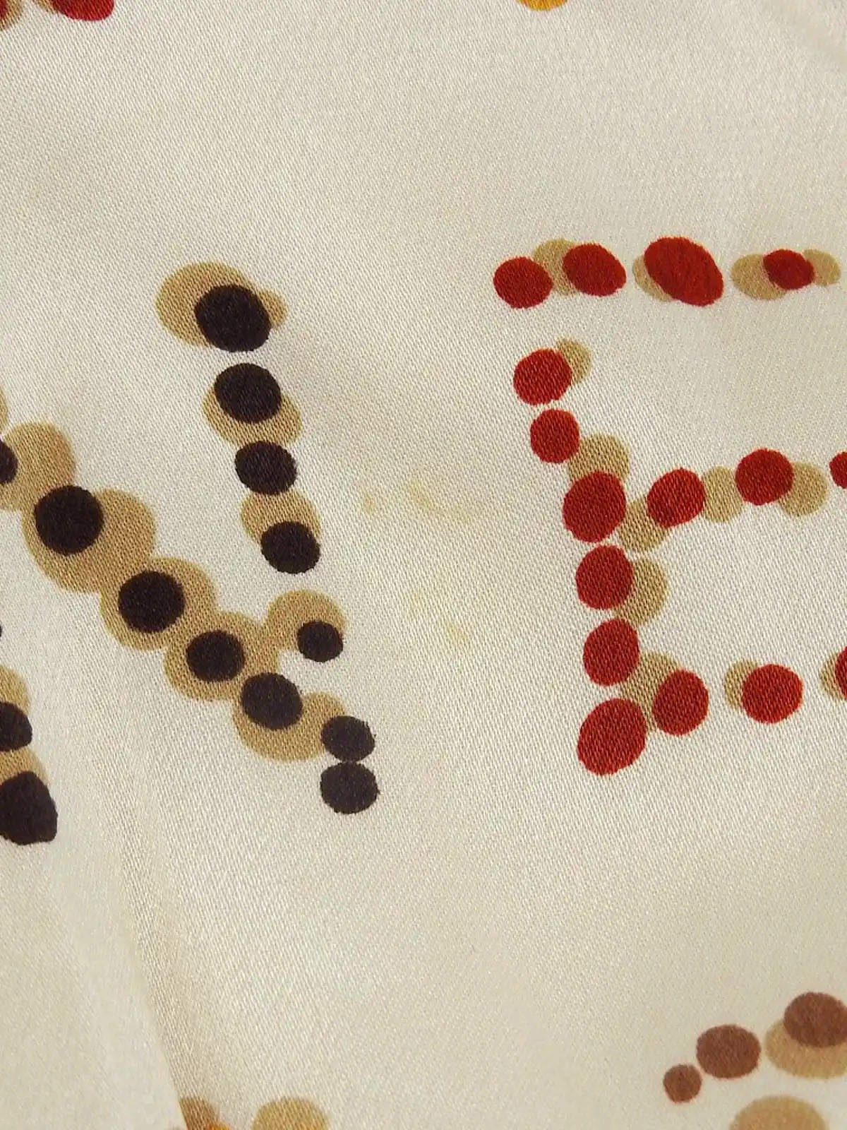 ウールシルクコンビロゴパターンロングスリーブトップス　クリーム