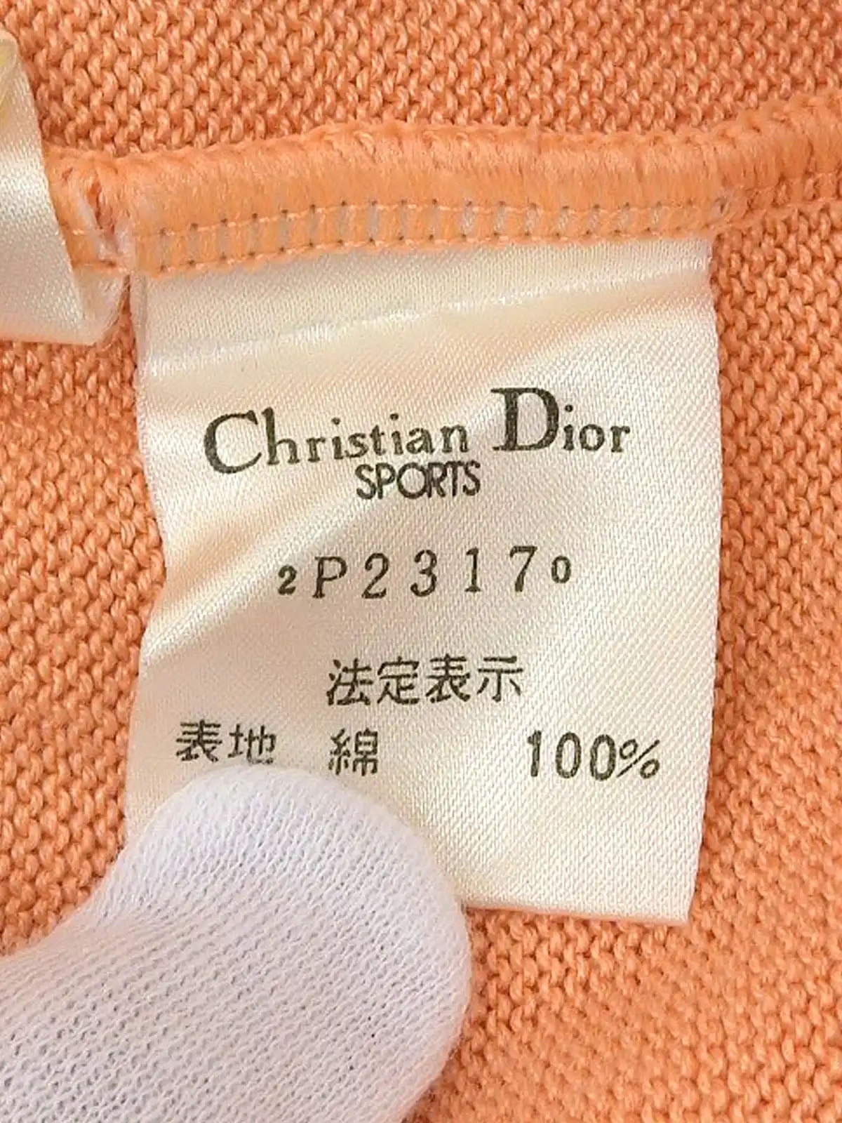 ロゴ刺繍ロングスリーブニットトップス　コーラルオレンジ