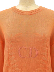 Logo Embroidered Long Sleeve Knit Top in Coral Orange