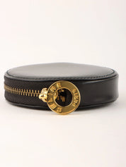 黑色圆形硬币盒，带标志牌