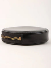 黑色圆形硬币盒，带标志牌