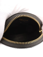 黑色圆形硬币盒，带标志牌