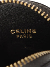 黑色圆形硬币盒，带标志牌