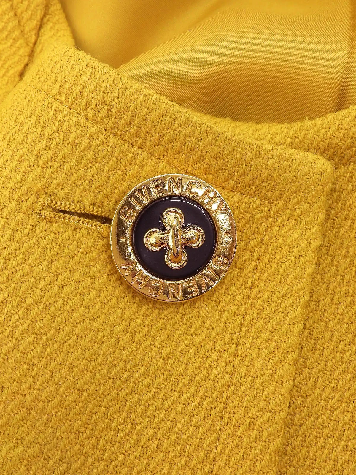 Wool design logo button collarless jacket in mustard