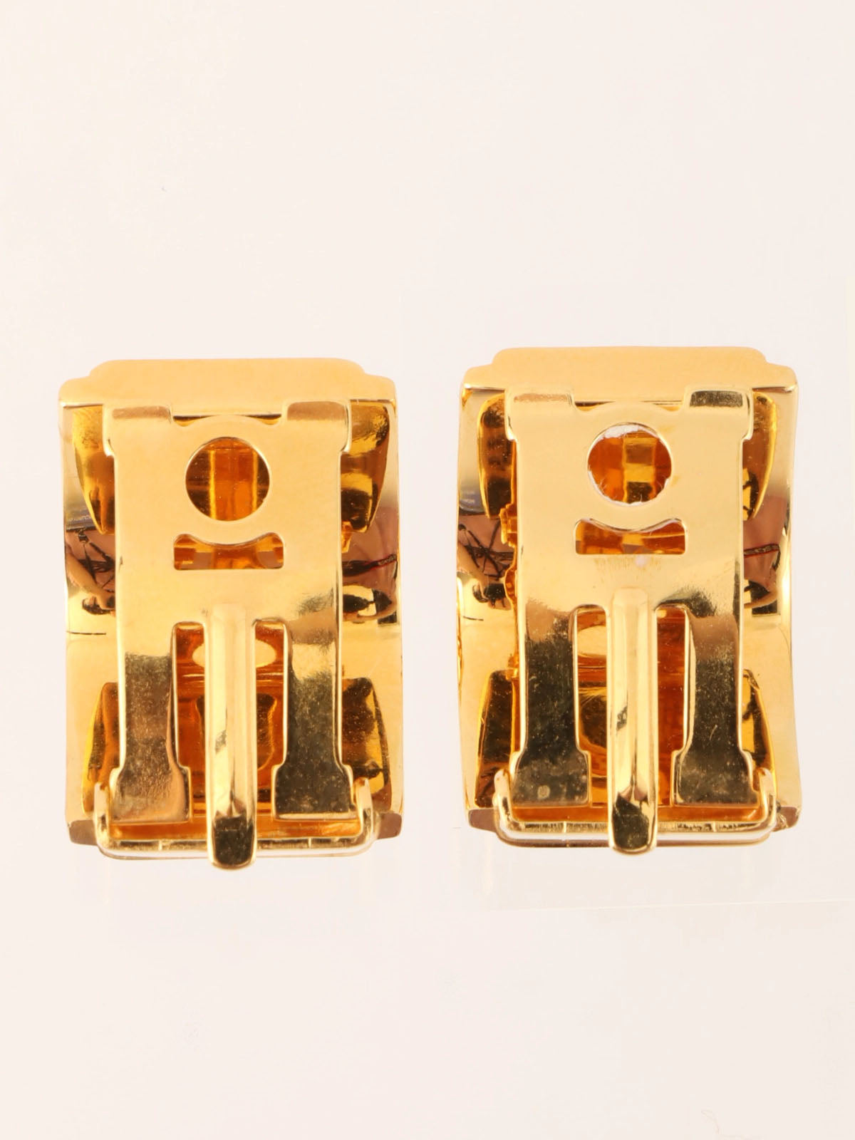 Enameled earrings in gold, green, and blue