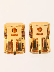Enameled earrings in gold, green, and blue