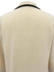 Two-tone rhinestone logo long sleeve knit top in ivory/black
