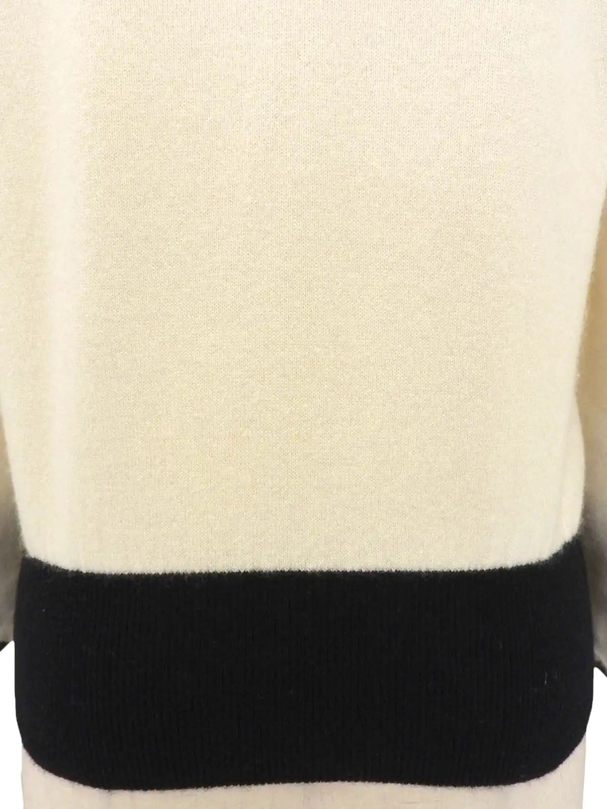 Two-tone rhinestone logo long sleeve knit top in ivory/black