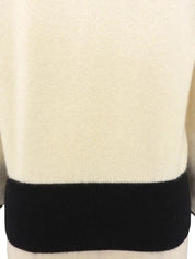 Two-tone rhinestone logo long sleeve knit top in ivory/black