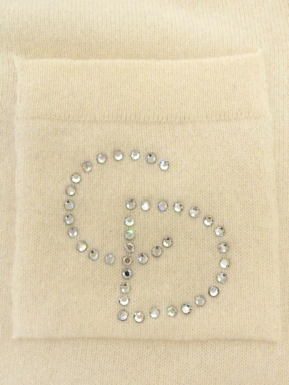 Two-tone rhinestone logo long sleeve knit top in ivory/black
