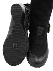 Black sheepskin logo buckle wedge sole boots