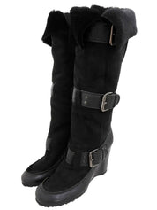 Black sheepskin logo buckle wedge sole boots