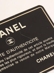 1985-1990 年黑色丝缎 CC 标志牌链条包