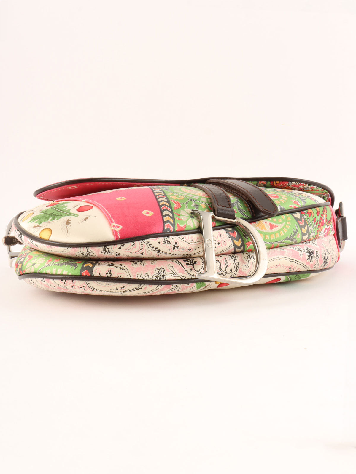Paisley pattern saddlebag in pink, green, and white